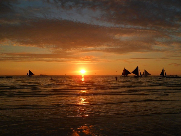 Beautiful sunset at White Beach on the island of Boracay, in the Philippines