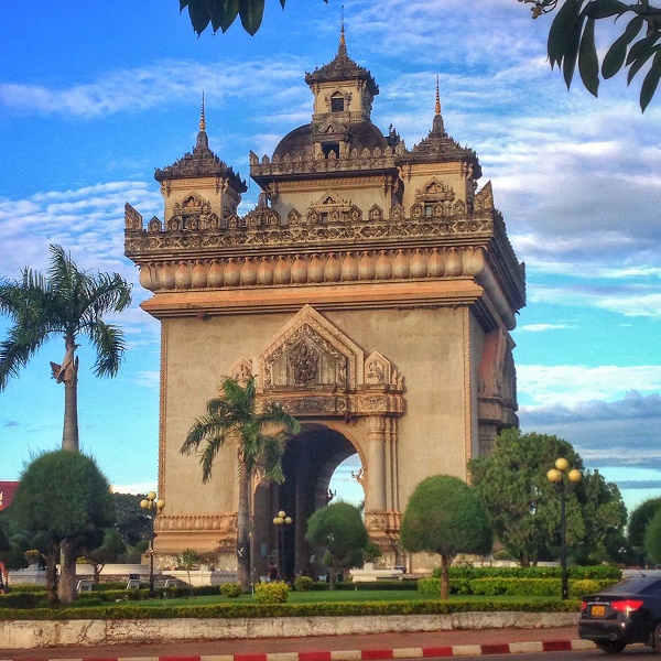 Patuxai building at sunset in Vientiane, Laos – Page Traveller