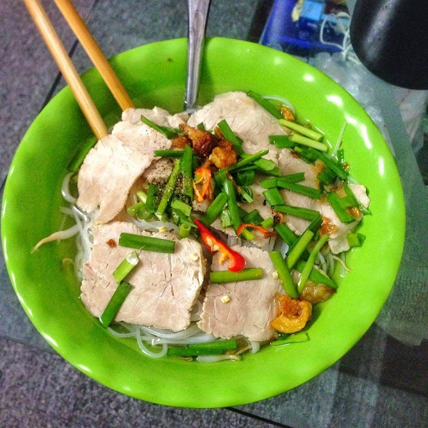 Street food soup noodles with pork, Saigon, Vietnam