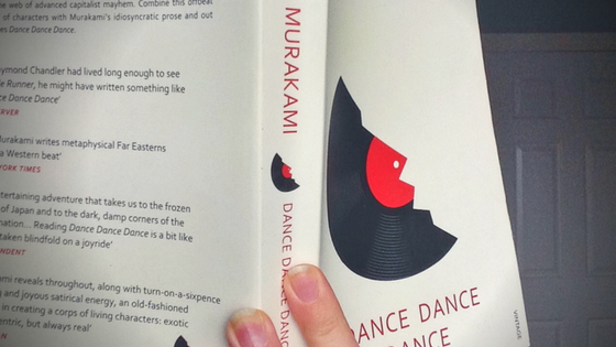 Reading a Book - Dance Dance Dance by Japanese Novelist Haruki Murakami